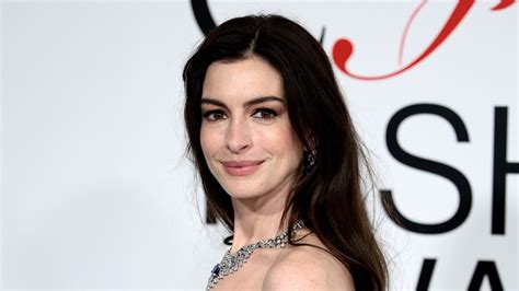 Anne Hathaway stuns in a bikini in latest photos as she candidly ...